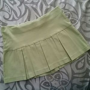 Green apple pleated skirt